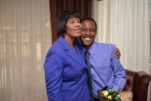 Prime Minister Portia Simpson Miller shares a moment with Jovante Anderson ’19.  Courtesy of Jamaican Office of the Prime Minister. 