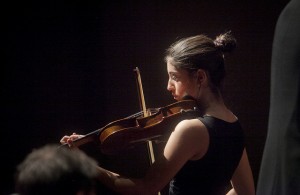 Female student at Lafayette College plays violin.